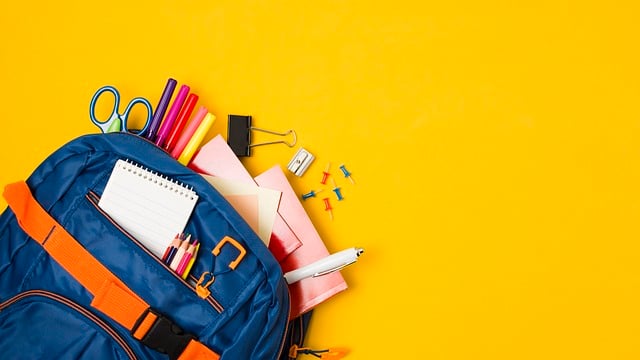 Colorful Backpack Filled With School Supplies image in article Backpacks, Pencils… and CPR? Why First Aid Belongs on Your Back-to-School List!